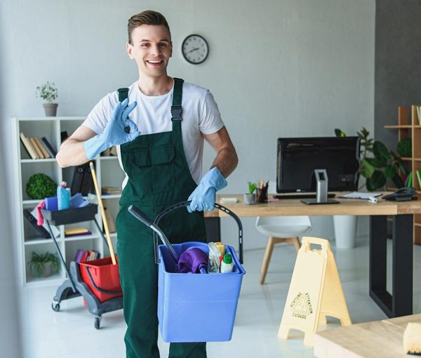 handsome-smiling-young-cleaner-holding-bucket-with-resize
