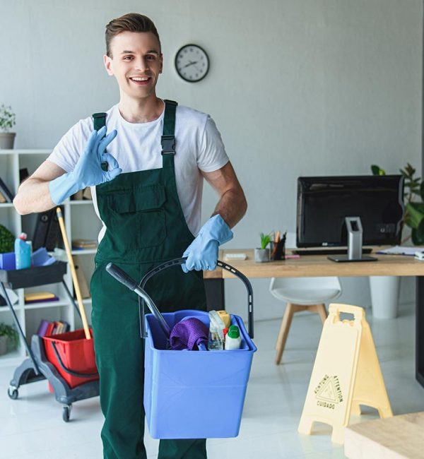 handsome-smiling-young-cleaner-holding-bucket-with-resize